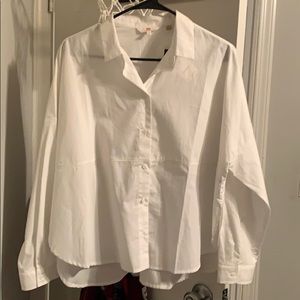 White button up blouse.